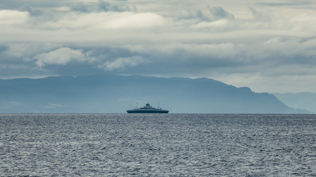 Dramatic clouds before storm and mountains.